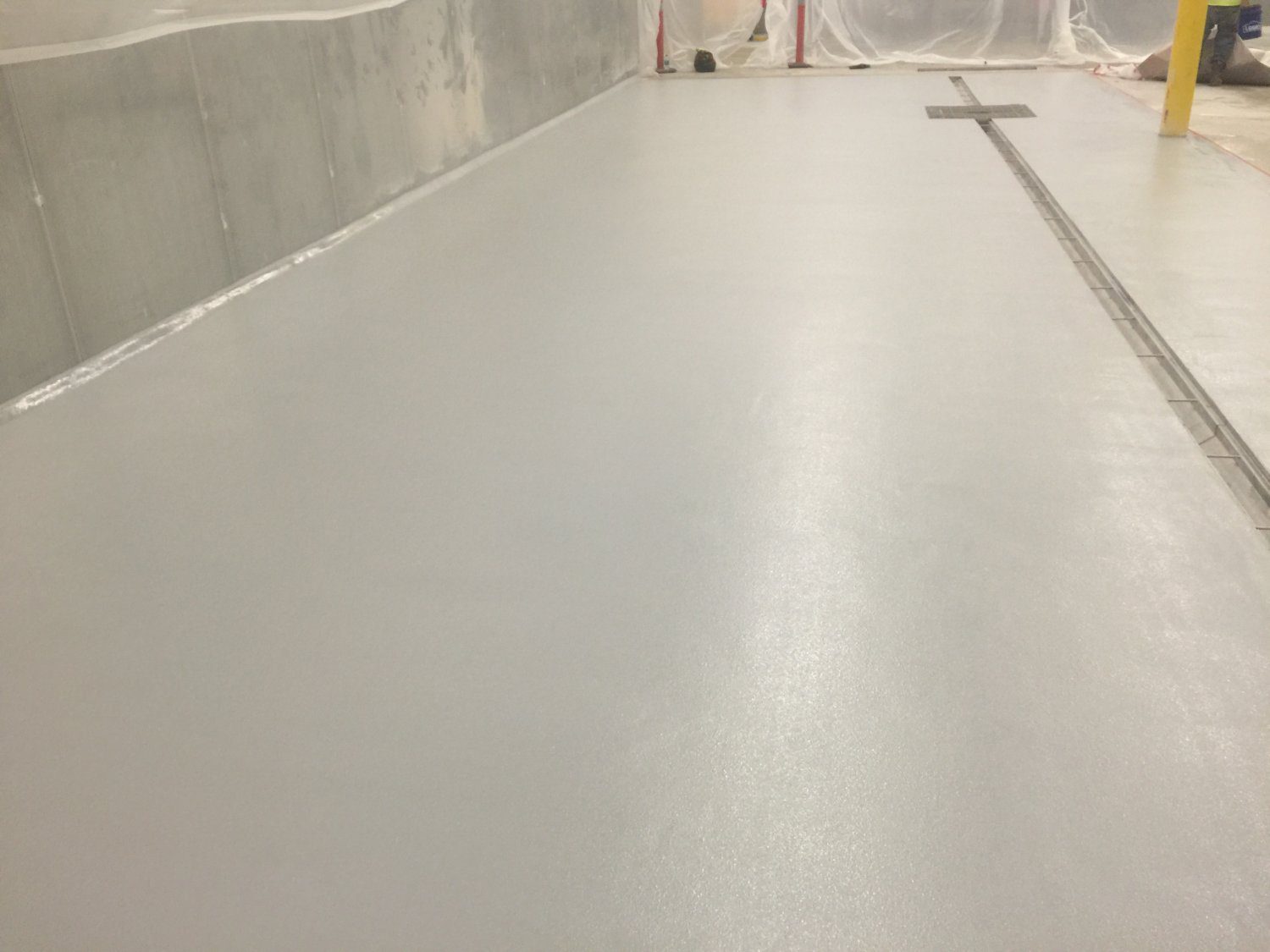 Freshly installed concrete surface indoors