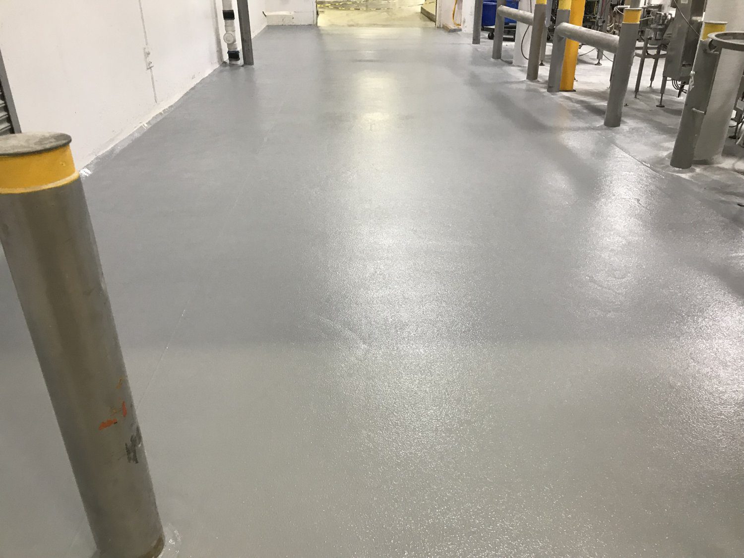 Gray epoxy floor in industrial setting
