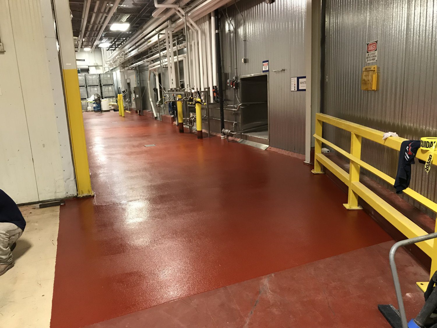 Warehouse passage featuring bright red floor