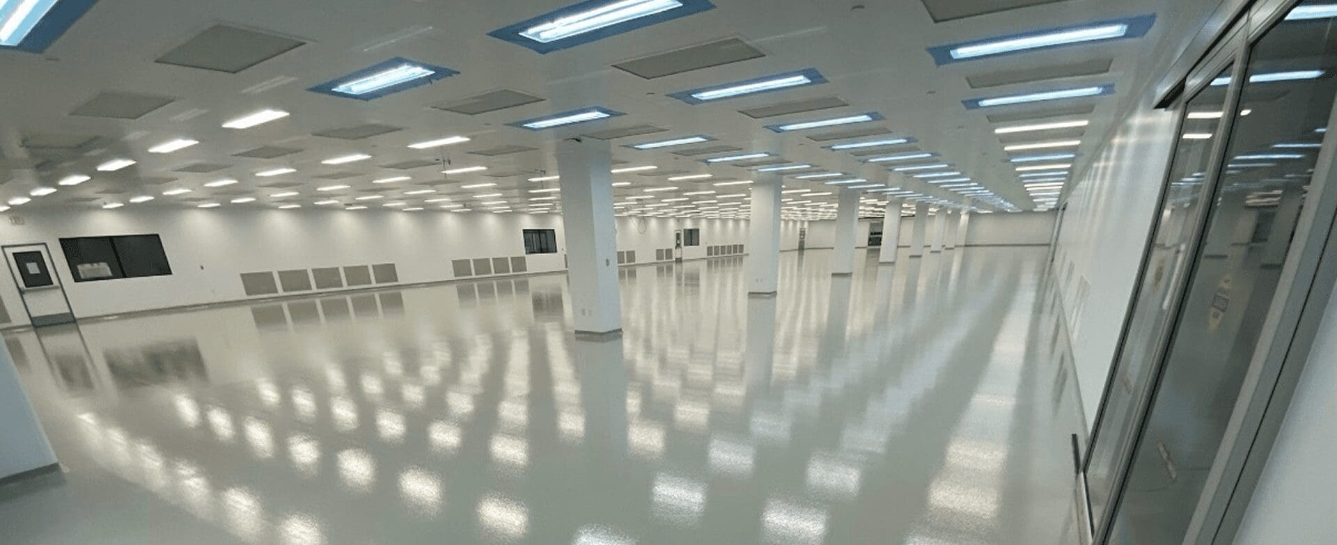 Modern clean industrial interior with ceiling lights